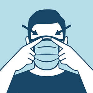 Person adjusting face mask over nose