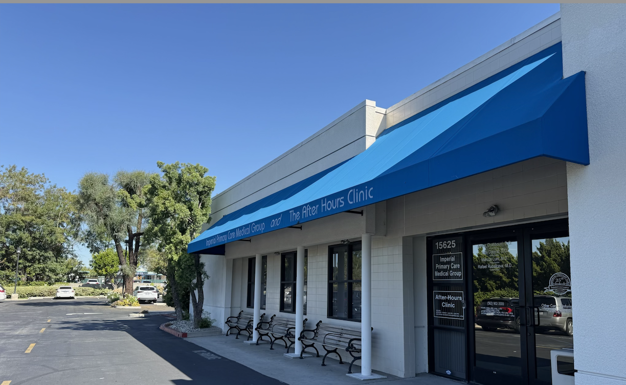 After-hours clinic storefront with blue awning